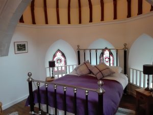 Scriptorium Garden bedroom with original stained glass windows