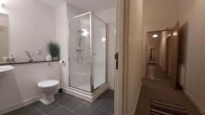 En suite bathroom with seperate shower and bath