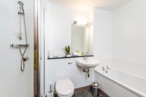 En suite bathroom with seperate shower and bath plus WC