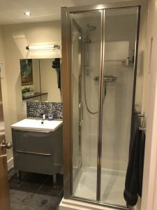 The family bathroom with shower cubicle