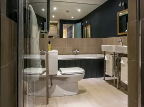 The en suite bathroom with underfloor heating, seperate shower and bath